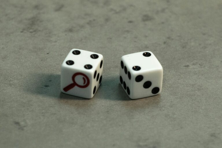 two dice next to one another